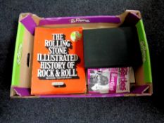 A box containing one volume The Rolling Stone Illustrated History of Rock n Roll,