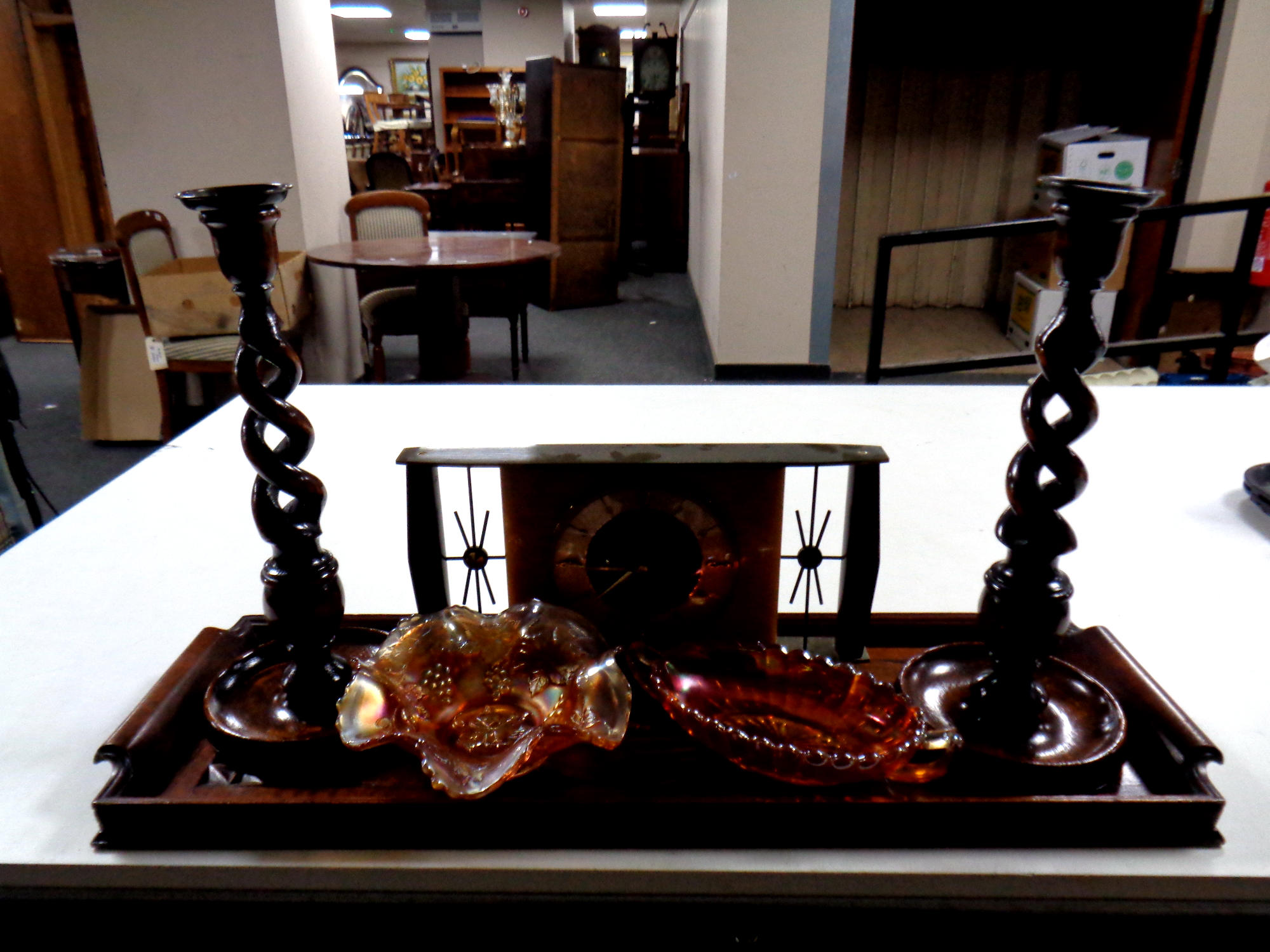 A carved wooden serving tray of mid 20th century Metamec mantel clock,