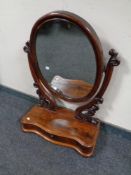 A Victorian mahogany dressing table mirror on stand