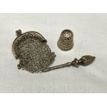A small silver purse together with thimble and tweezers