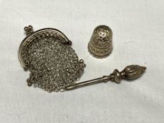 A small silver purse together with thimble and tweezers