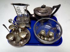 A tray of assorted plated wares : cruet set on stand, teapot, candle sticks, napkin rings,