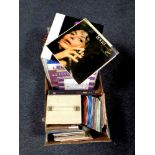 A box containing a large quantity of vinyl LPs and 45 singles to include Lena Horne, Petula Clark,