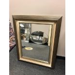 A two tone contemporary mirror,