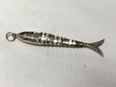 A silver fish pendant