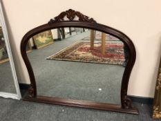 A Victorian style mahogany overmantel mirror, width 127 cm.