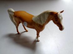 A Beswick Palomino Arabian horse