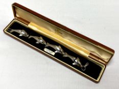 A silver dolphin bracelet