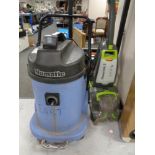 A Numatic industrial vacuum togetehr with a Vax Powermax 2 carpet cleaner