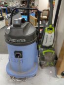 A Numatic industrial vacuum togetehr with a Vax Powermax 2 carpet cleaner