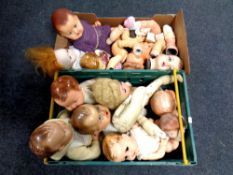Two boxes containing a quantity of 20th century and later plastic and porcelain dolls