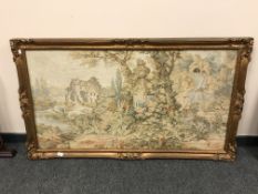 A gilt framed tapestry depicting cherub waterfall in gardens, 129 cm x 68 cm.