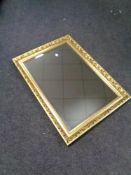 A gilt framed bevel edged mirror