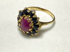 A 9ct gold garnet and ruby ring