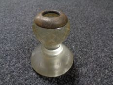 An antique cut glass match striker with silver rim