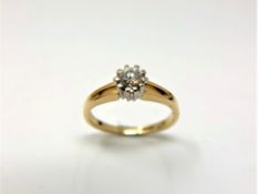 An 18ct gold diamond solitaire ring, the brilliant cut stone weighing approximately 0.