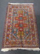 A Caucasian Kazak rug,