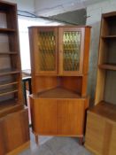 A mid 20th century Danish teak corner cabinet