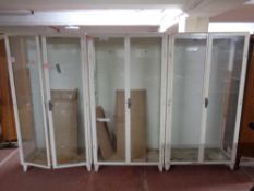 Three 20th century metal framed double door medical cabinets, width 93 cm,