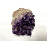 A large amethyst rock crystal sample,