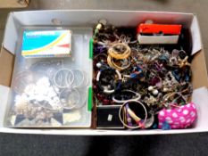 A box containing a large quantity of costume jewellery, boxed opera glasses,