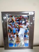 A signed photograph - Alastair Cook, 19 cm x 29.5 cm, mounted.