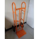 A heavy duty twin handled sack barrow with spring axle