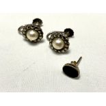 Three sterling silver earrings,