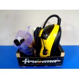 A Little Yello steam cleaner with accessories