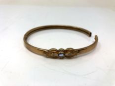 A 9ct gold gem set bangle (as found) CONDITION REPORT: 9g