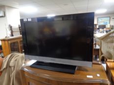 A Sony Bravia 26'' LCD TV with remote