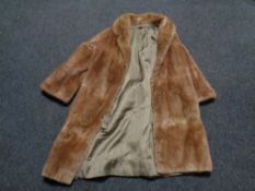 A mink fur three quarter length coat