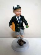 A Royal Doulton figure - Off to school,