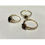 Three 9ct gold rings set with gemstones