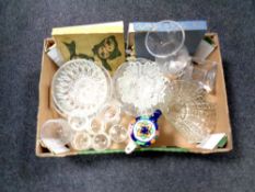 A box containing assorted glassware together with boxed cutlery and a ceramic coffee pot