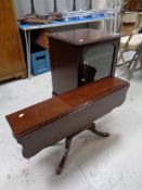 A Stag Minstrel audio cabinet together with a Regency style flap sided coffee table (as found)