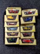 A tray containing 11 Matchbox Models of Yesteryear die cast delivery vans and classic cars,