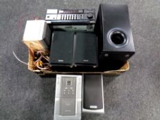 A box containing Matsui micro hifi system, pair of Denon speakers, sub woofer,