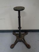 A cast iron pub table pedestal