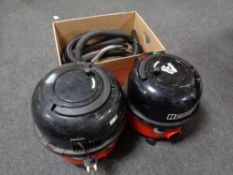 Two Henry vacuum cleaners (one with hose)