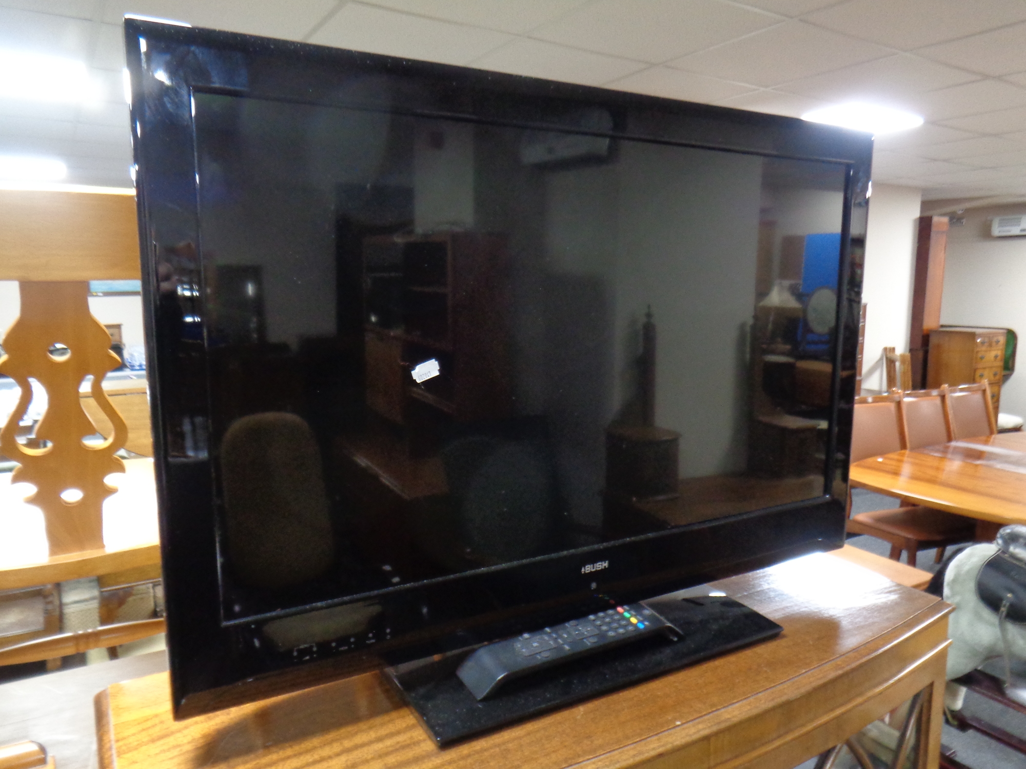 A Bush 32'' LCD TV with remote