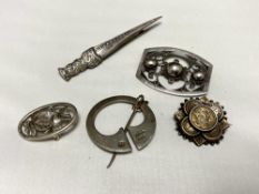 Five silver brooches