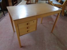 A 20th century Scandinavian desk fitted three drawers