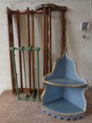 An antique painted corner wall shelf together with three wall mounted plate and clothes racks