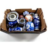 A box containing antique and later oriental wares to include vases, teapot,