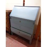 A painted 20th century bureau fitted three drawers