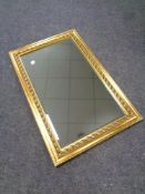 A gilt framed bevel edged mirror