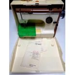 A Friester Rorsman electric sewing machine in case,