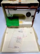 A Friester Rorsman electric sewing machine in case,