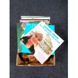 A box containing a large quantity of vinyl LPs, female artists, Peggy Lee, Petula Clark,